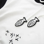 Close-up of spring long sleeve cute cat sweatshirt with fish designs and black white color