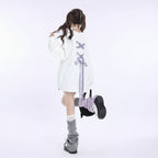 White sweet ribbon hoodie japanese style with lavender ribbon detail on back worn by model