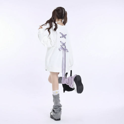 White sweet ribbon hoodie japanese style with lavender ribbon detail on back worn by model