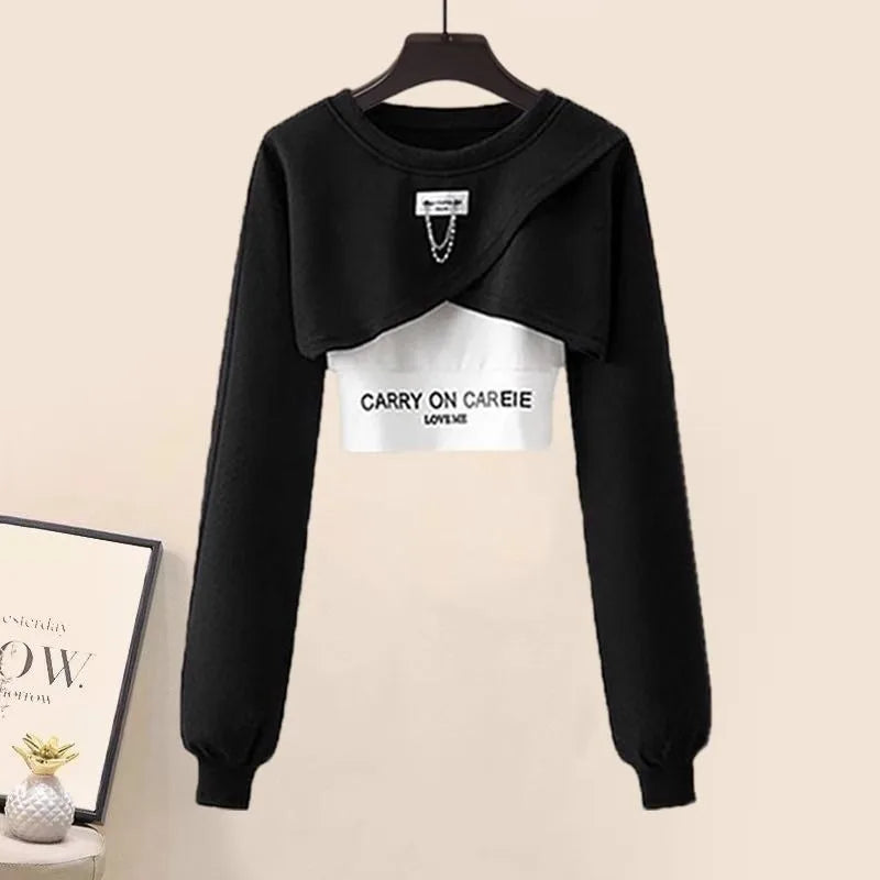 Black and white three piece streetwear set for women with cropped sweatshirt and layered design