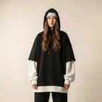 Autumn winter unisex casual pullover worn by person with hood, displayed alongside beige and navy pullovers on hangers