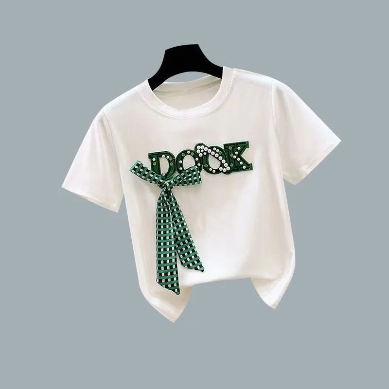 White t shirt with green bowknot and text design from Vusy Kawai Shop for bowknot t shirt and split midi skirt outfit