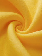 Close-up of soft yellow fabric texture for casual kawaii hoodie for women