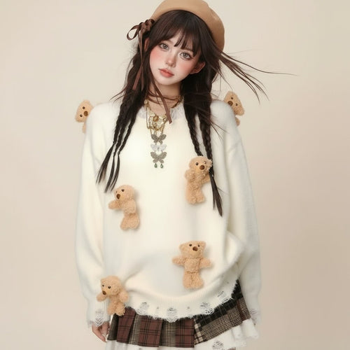Woman wearing a cute bear knitted sweater for women in white with teddy bear appliques