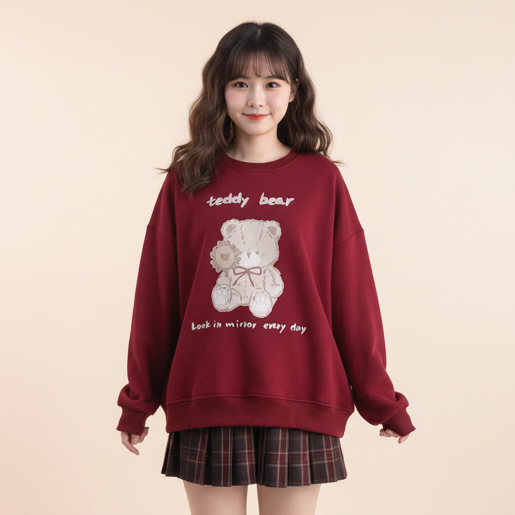 Cute red bear o-neck hoodie Japanese style with teddy bear graphic and text worn with plaid skirt