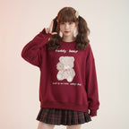 Cute red bear o-neck hoodie Japanese style with teddy bear graphic worn by girl with pigtails