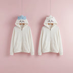 Two cute usagi bunny zip up hoodies in white with embroidered faces and small ears on the hood