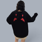 Black gothic demon wings sweatshirt for women with red wing details on back and hood