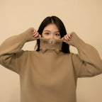 Japanese cartoon cat pullover for women in beige with a cute cat face on the high collar