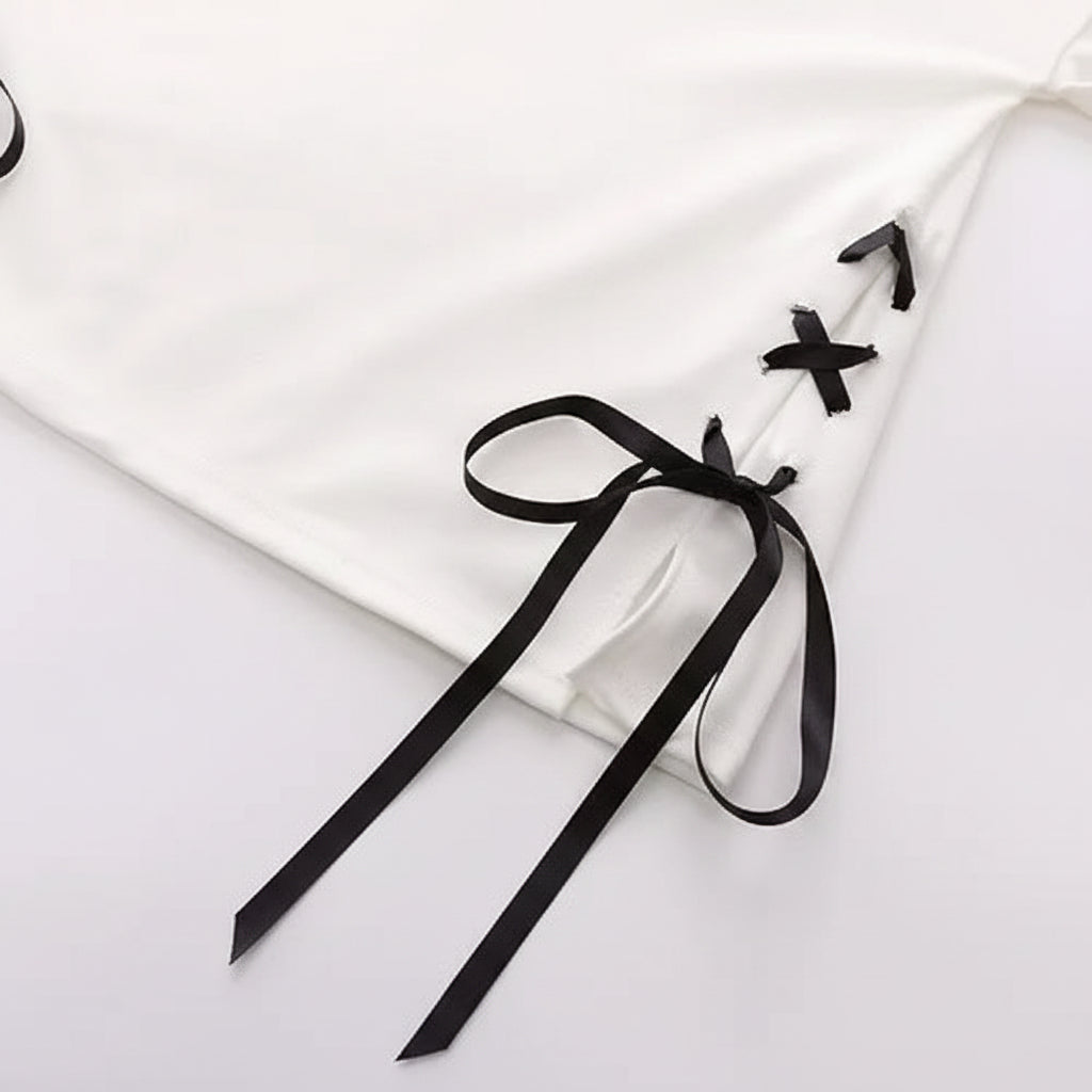 Close-up of white japanese soft girlcat style hoodie with black ribbon lace-up detail