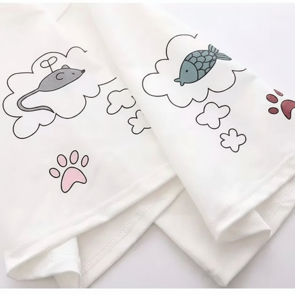White fabric detail of japanese soft girlcat style hoodie with cute mouse, fish, and paw print illustrations