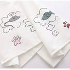 White fabric detail of japanese soft girlcat style hoodie with cute mouse, fish, and paw print illustrations