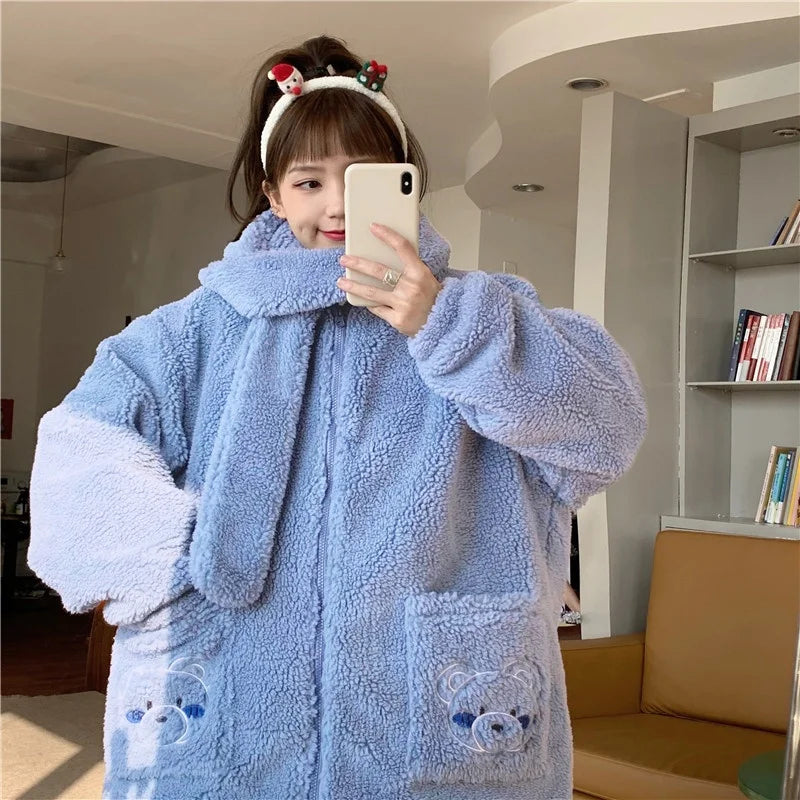 Woman wearing a blue kawaii fluffy jacket for women with bear pocket design and scarf collar