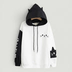 Vusy Kawaii Shop Official black and white cat ear hoodie with Japanese text on sleeve and cat face graphic.