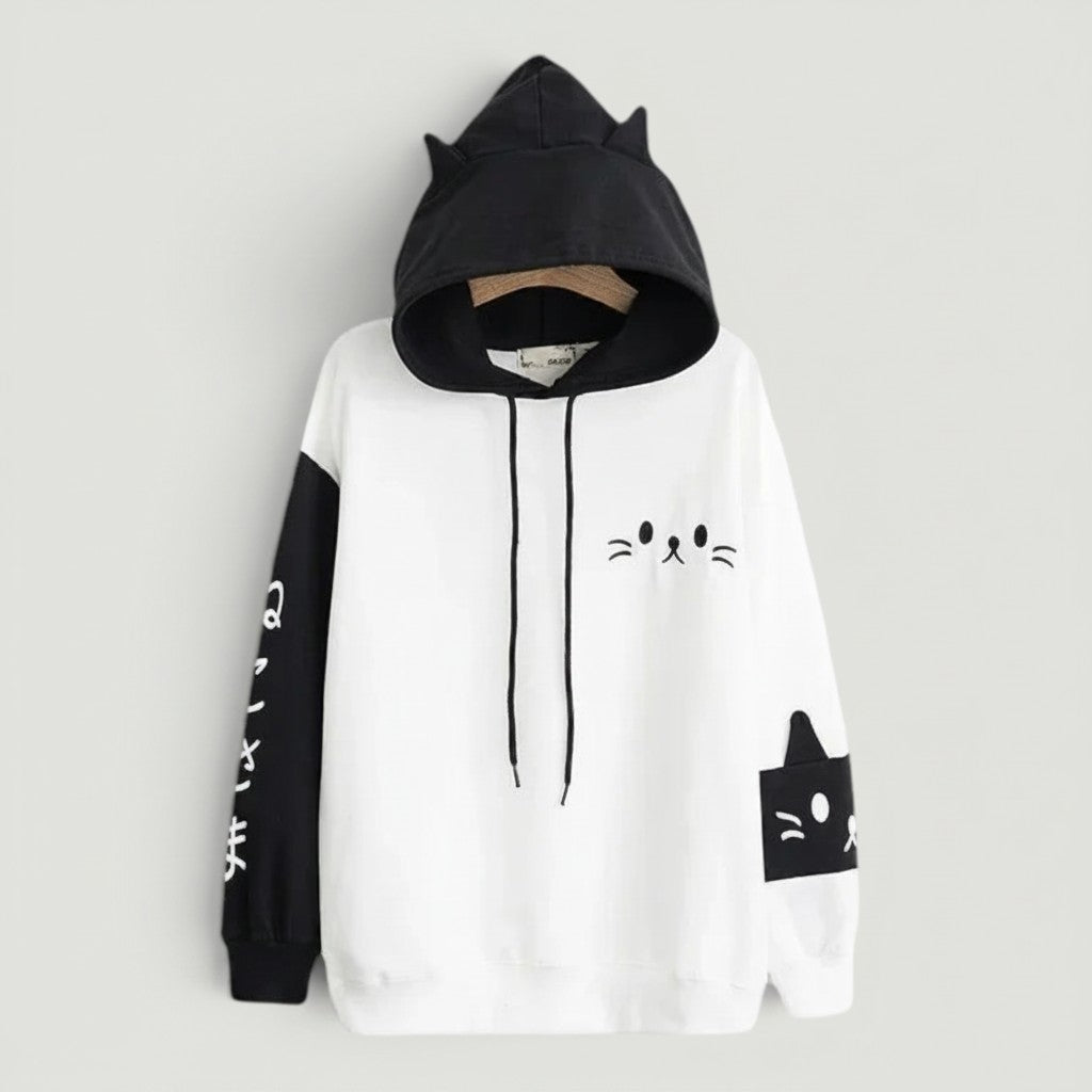 Vusy Kawaii Shop Official black and white cat ear hoodie with Japanese text on sleeve and cat face graphic.