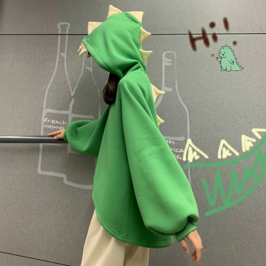 Vusy Kawaii Shop Official green cartoon dinosaur hoodie with adjustable drawstring hood and cream spikes on hood.