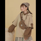 Vusy Kawaii Shop Official beige and brown layered long sleeve hoodie with bear details and drawstring hood.