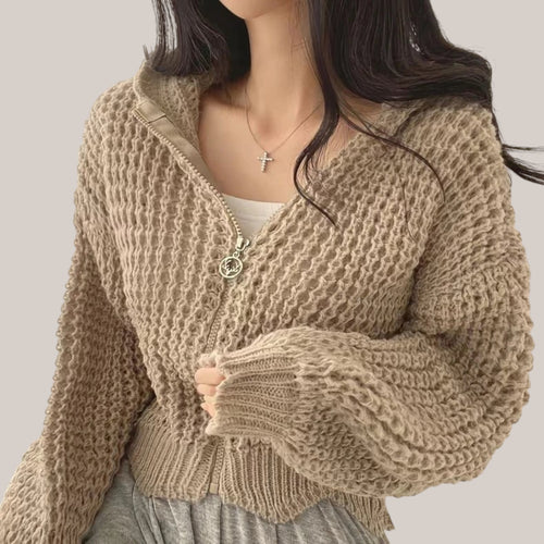 Vusy Kawaii Shop Official beige knit zip-up hoodie with a waffle texture and drawstring hood. Model wears it open over a white top.
