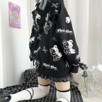 Vusy Kawaii Shop Official black cotton-polyester blend hooded sweatshirt with all-over cartoon bear and scissors print.
