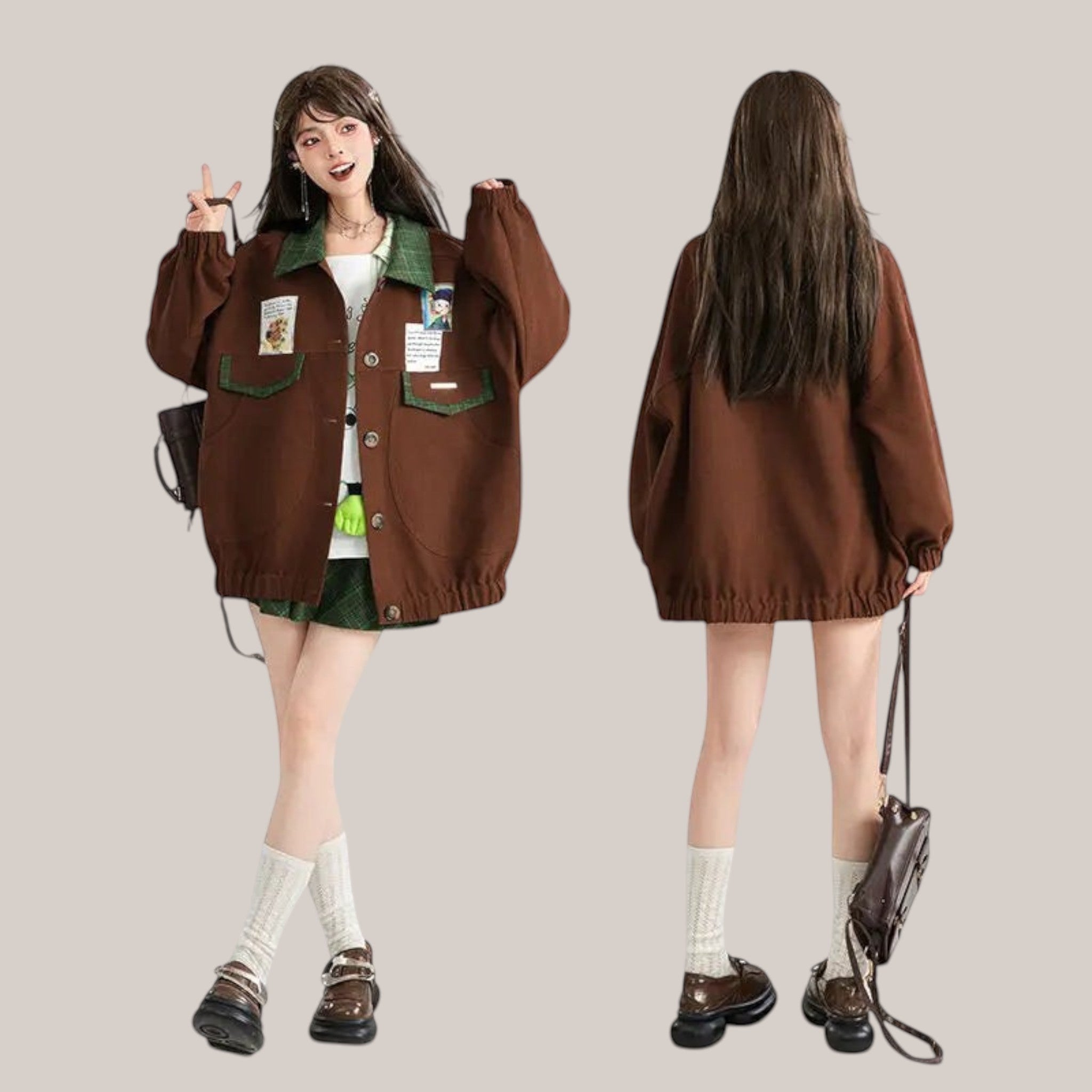 Vusy Kawaii Shop Official brown bomber jacket with green collar and pockets, featuring Japanese style patches. Model wears it with a white top and green plaid skirt.