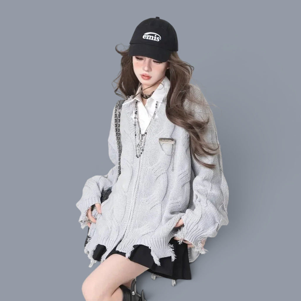 Vusy Kawaii Shop Official light grey distressed cable knit V-neck sweater with frayed hem and cuffs, worn by a model.