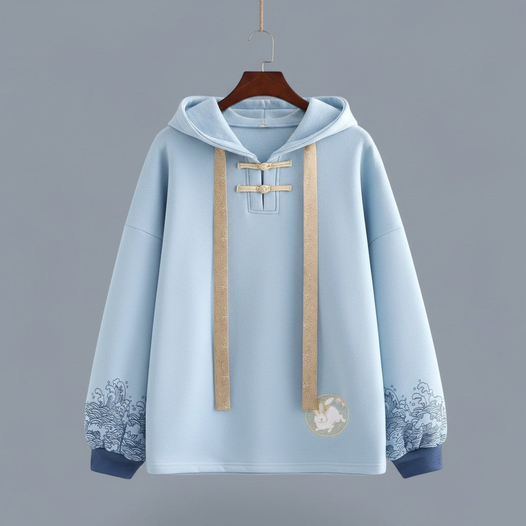 Vusy Kawaii Shop Official light blue cotton-polyester blend hoodie with frog closure, drawstring, and wave embroidery on sleeves.