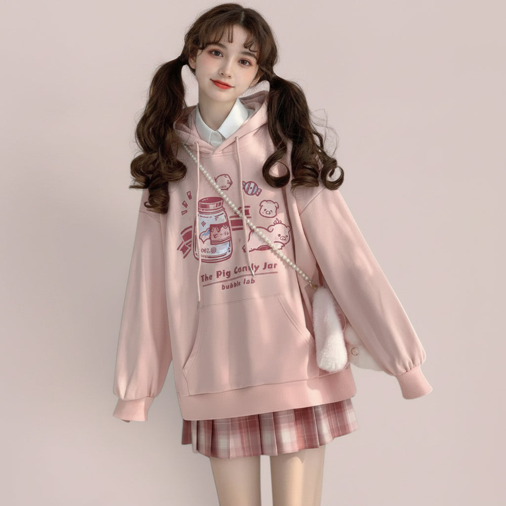 Vusy Kawaii Shop Official pink cotton-polyester blend oversized hoodie with a cute pig and candy jar graphic print.