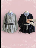 Vusy Kawaii Shop Official grey and navy two-piece set with striped shirt and tie, featuring a V-neck sweatshirt and tiered skirt.
