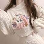 Vusy Kawaii Shop Official white cable knit sweater with embroidered bunny and cupcake graphic, high neck, long sleeves.