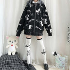 Vusy Kawaii Shop Official black hooded sweatshirt with all-over cartoon bear and scissors print, made from cotton-polyester blend.