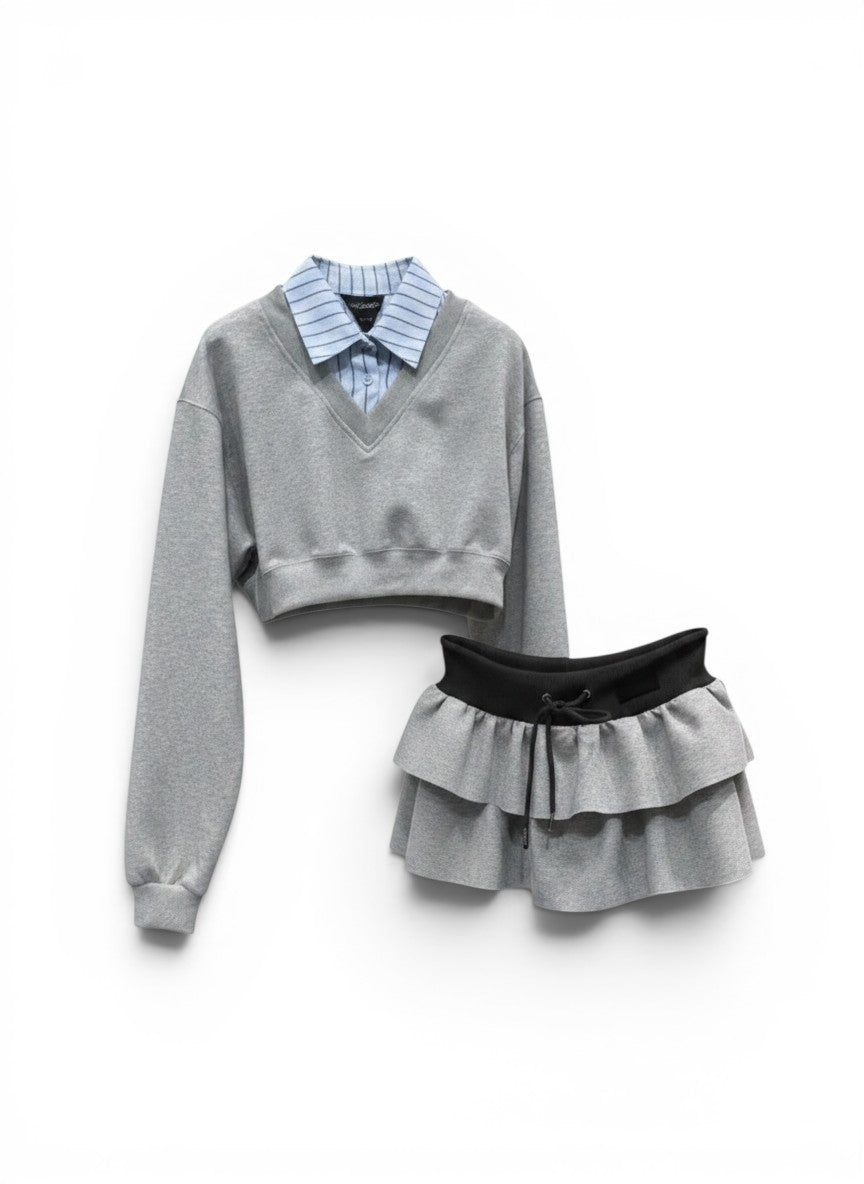 Vusy Kawaii Shop Official grey v-neck cropped sweatshirt with blue pinstripe collar and layered ruffle skirt with black waistband.