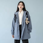 Women's preppy style Korean streetwear coat in blue oversized fit with hood and zip closure