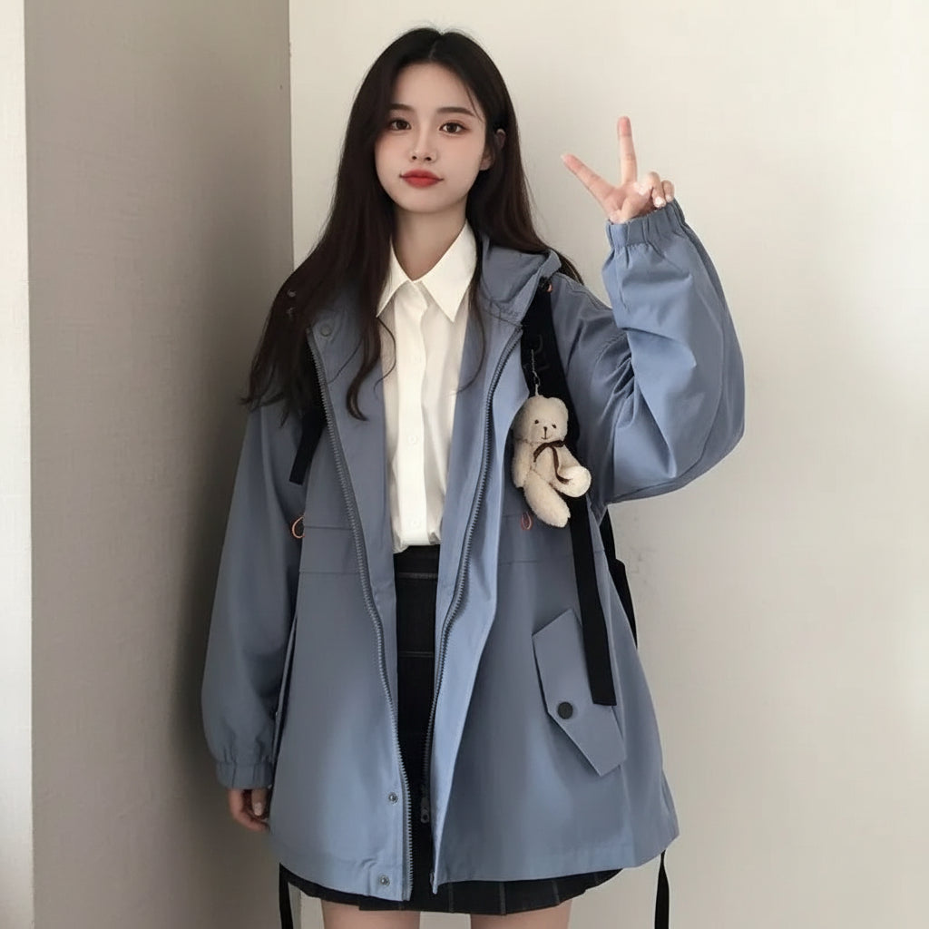 Women's preppy style Korean streetwear coat in light blue with oversized sleeves and a teddy bear keychain