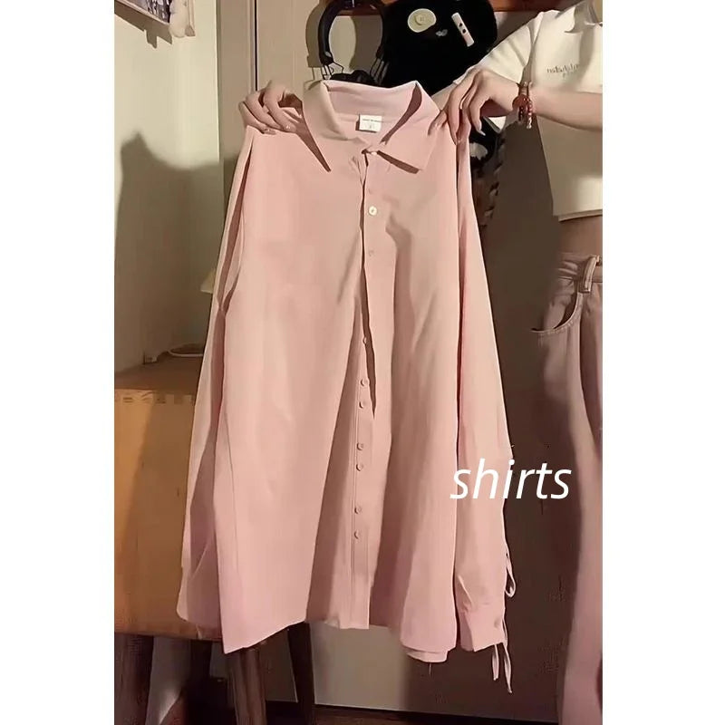 Pink button-up shirt hanging on hanger for Women’s Spring Fall Preppy Bandage Knit Vest & Plaid Skirt Set
