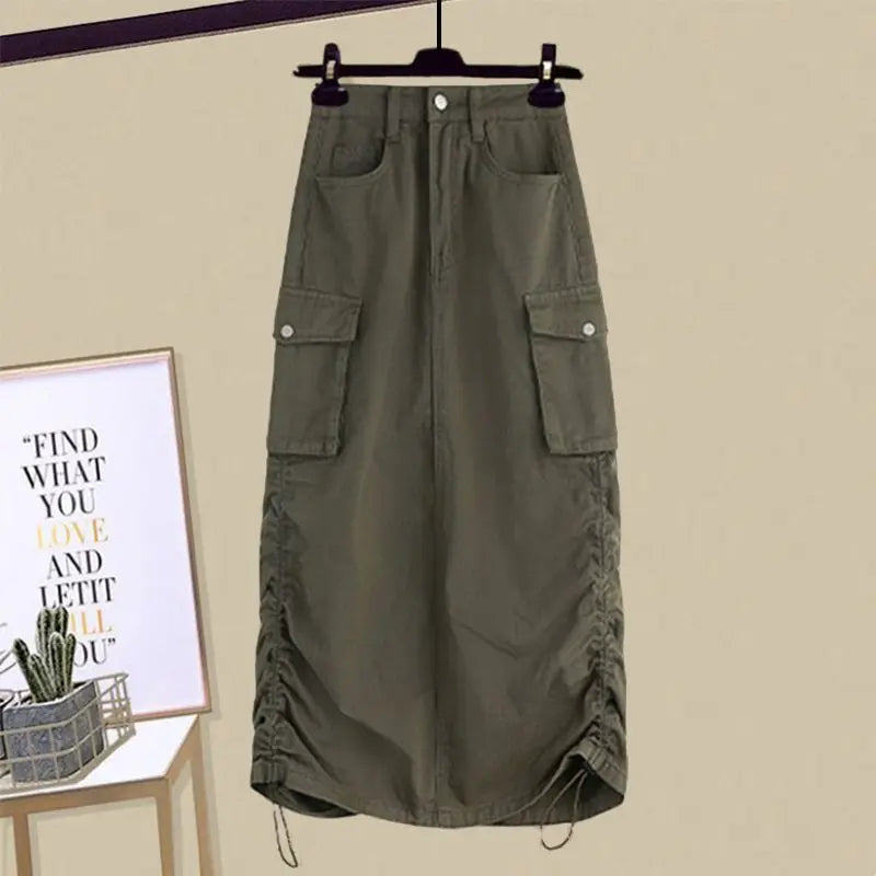Olive green cargo skirt with ruched sides hanging on hanger from Vusy Kawai Shop women's summer patchwork two piece set