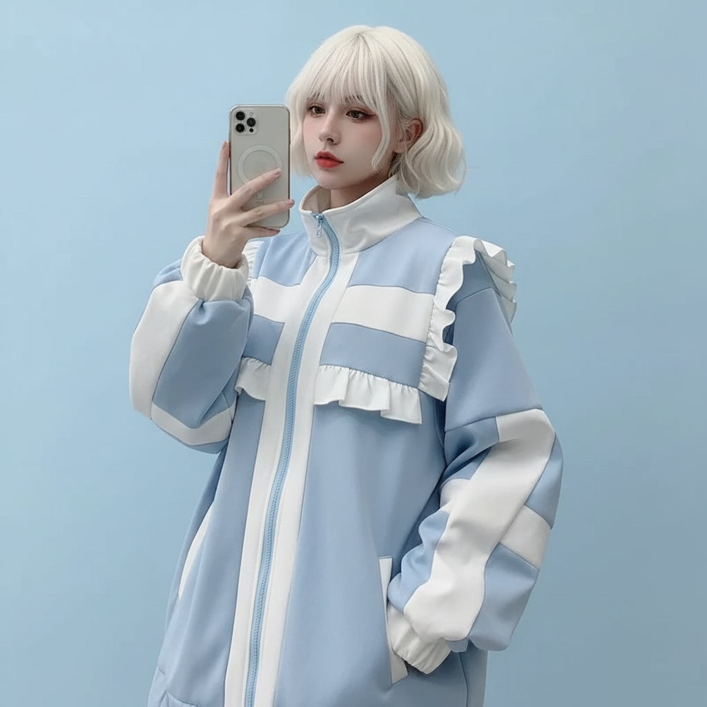 Casual layered coat for girls in light blue and cream with ruffle details and zip front
