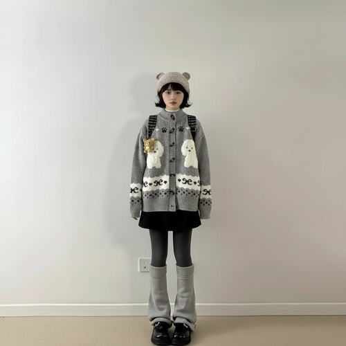 Cute dog cartoon sweater for women in gray with white dog designs worn by model with coordinating hat and boots