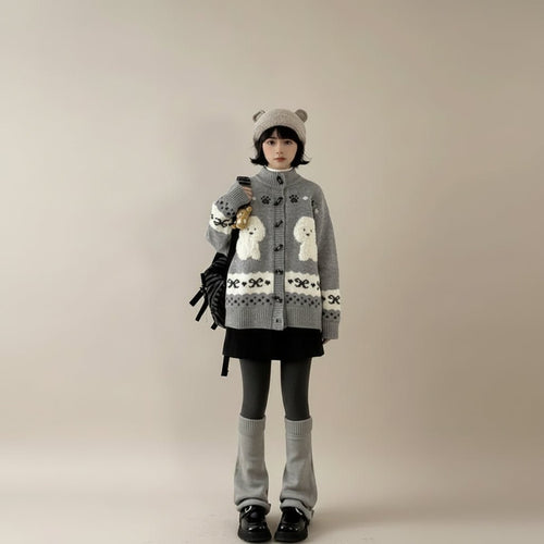 Woman wearing cute dog cartoon sweater for women in gray with white dog designs and cozy winter accessories