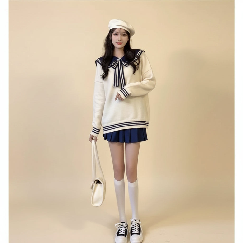 Woman wearing new trendy korean sweaters white oversized sailor collar sweater with navy stripes