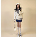 Woman wearing new trendy korean sweaters white oversized sailor collar sweater with navy stripes