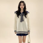 New trendy korean sweaters cream color with navy sailor collar and striped bow detail